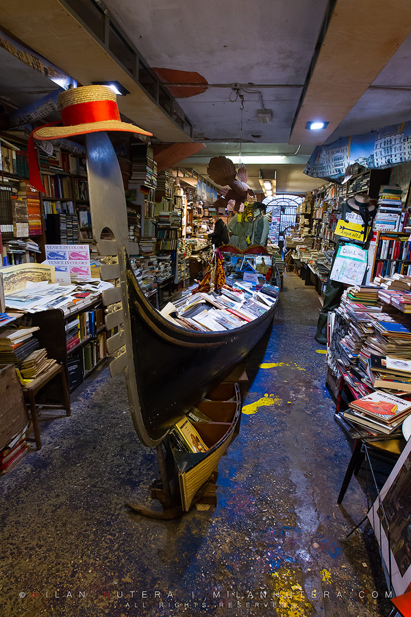 The famous Venetian bookstore with gondola serving as a bookshelf.