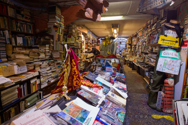 The famous Venetian bookstore with gondola serving as a bookshelf.
