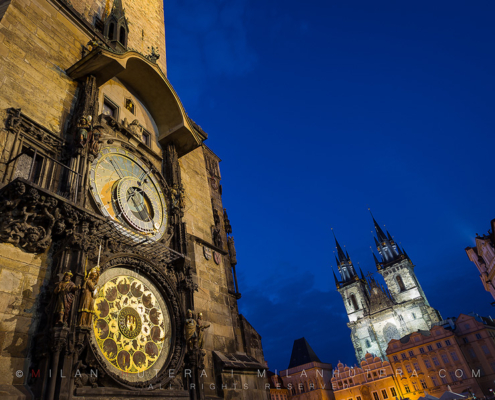 The famous Astronomical Clock on Old Town Square in Prague during the twilight hour. This marvel of engineering was constructed in 1410 and it's the oldest astronomical clock that is still operational. It shows 21 different astronomic functions.