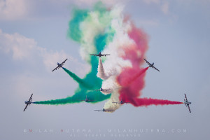 Italian aerobatic team Frecce Tricolori (313° Gruppo Addestramento Acrobatico) draws the Italian flag on their farewell fly-by during SIAF 2015 in Sliac, Slovakia.