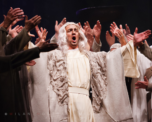 Zaccaria, high priest of the Jews, raises his hands along with other singers during the open air rendition of Nabucco. Nabucco is an four act opera composed in 1841 by Giuseppe Verdi. The open air opera was held in the gardens of Lednice Castle.