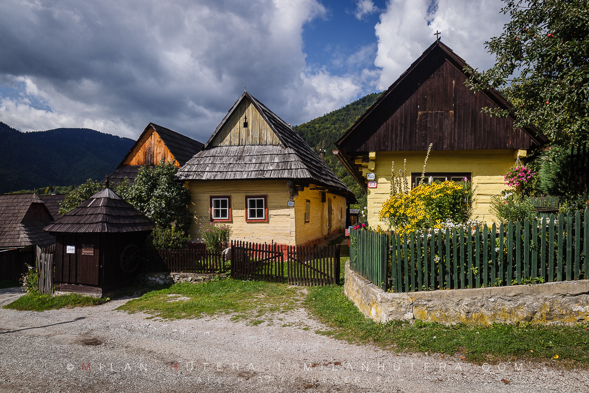 The old loghouses of Vlkolinec Village in a late summer morning light. Vlkolinec is a hilltop village located above the town of Ruzomberok, Northern Slovakia. It has been a part of UNESCO World Heritage Site since 1993 for its accurate display of the historic village settlements in Central Europe. It consists of more than 40 loghouses. Its current population is less than 20.