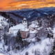 An incredible display of sunset colors at the famous overlook of Spania Dolina. The entire valley received a decent snowfall the very same day. Spania Dolina is a famous mining village in Central Slovakia. The hill in the middle of the village houses the Church of Transfiguration.