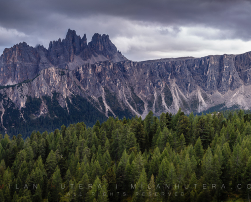 The Dolomitic ridge lines of Croda da Lago and Lastoni di Formin during a bleak september evening. The spectacular shape of the mountains remind me of a ship that crashed to this area in ancient times.