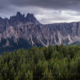 The Dolomitic ridge lines of Croda da Lago and Lastoni di Formin during a bleak september evening. The spectacular shape of the mountains remind me of a ship that crashed to this area in ancient times.