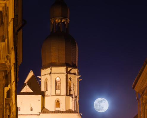 A "Super Snow Moon" rises next to the tower of Basilica of Saint Nicolas in Trnava, Slovakia on the evening of February 19th, 2019.