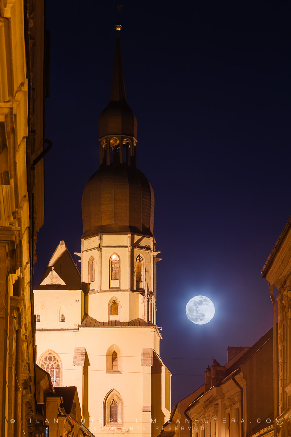 A "Super Snow Moon" rises next to the tower of Basilica of Saint Nicolas in Trnava, Slovakia on the evening of February 19th, 2019.