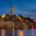 Panoramic photograph of Rovinj Croatia showing the transition from twilight sky to night city lights