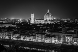 Florence night skyline view in black and white taken from Piazzale Michelangelo showing the illuminated Santa Maria del Fiore Cathedral and the city of Florence