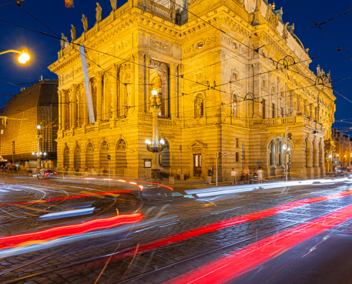 National Theatre Rush Hour in Prague captured with long exposure light trails of cars and public transport