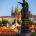 The Saint's Touch, Prague, Czech Republic — St John the Baptist statue on Charles Bridge "touches" the distant spire of St Vitus Cathedral in the morning light