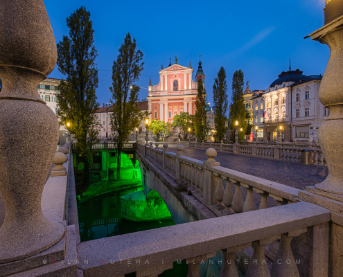 The Triple Bridge in Ljubljana, Slovenia, captured completely empty at dawn with morning light.