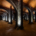 An asymmetrical, wide-angle interior photograph of the 1894 Žlutý Kopec water reservoir in Brno, showcasing a vast forest of brick pillars and cross-vaulted ceilings.