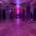 Cyberpunk-style laser light art installation reflecting on the concrete pillars and architecture inside the 1917 Žlutý kopec water reservoir.