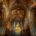 The magnificent Vysehrad Basilica sanctuary in Prague showcasing the golden high altar and stained glass windows.